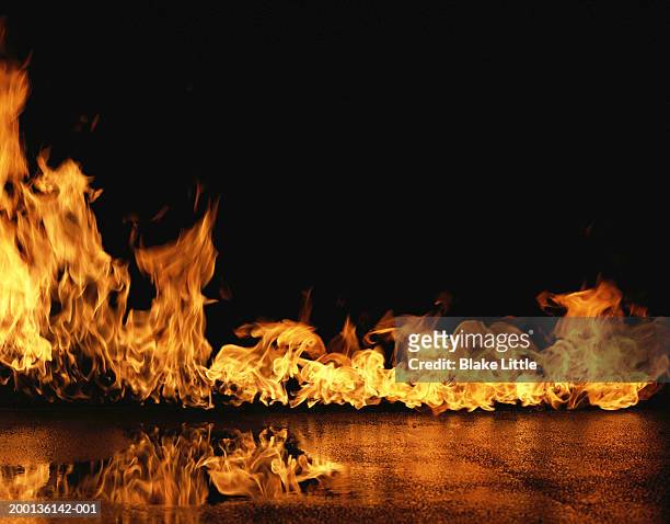 flames on concrete - 炎 ストックフォトと画像