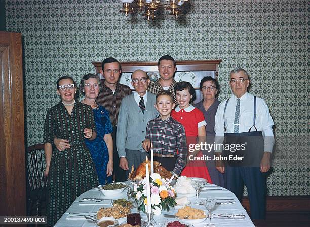 three generational family by thanksgiving dinner table, portrait - past stock photos et images de collection