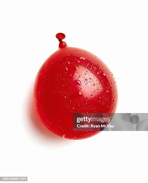 water balloon - red balloon stock pictures, royalty-free photos & images