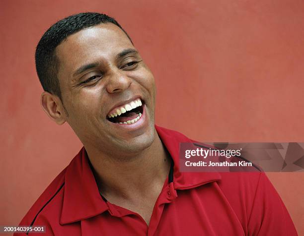 young man laughing - toothy smile stock pictures, royalty-free photos & images