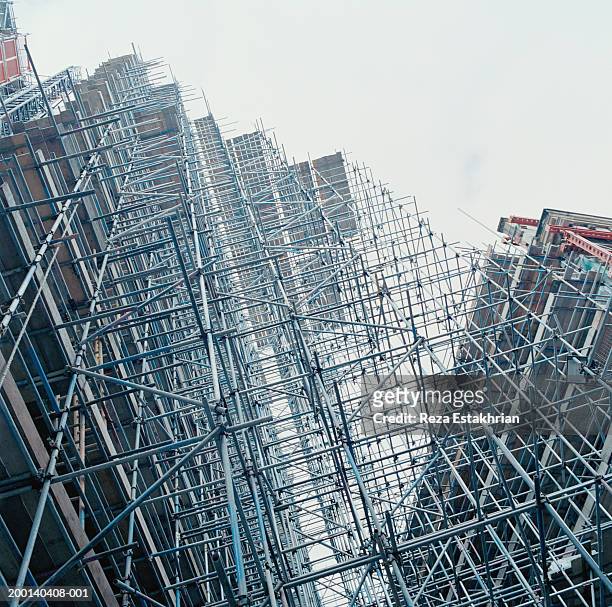 construction scaffolding, low angle - baugerüst stock-fotos und bilder