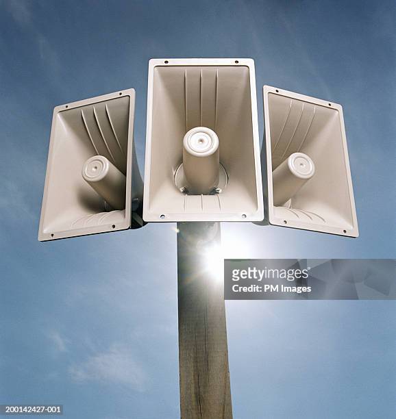 outdoor loudspeakers with sun flare - public address system stock pictures, royalty-free photos & images