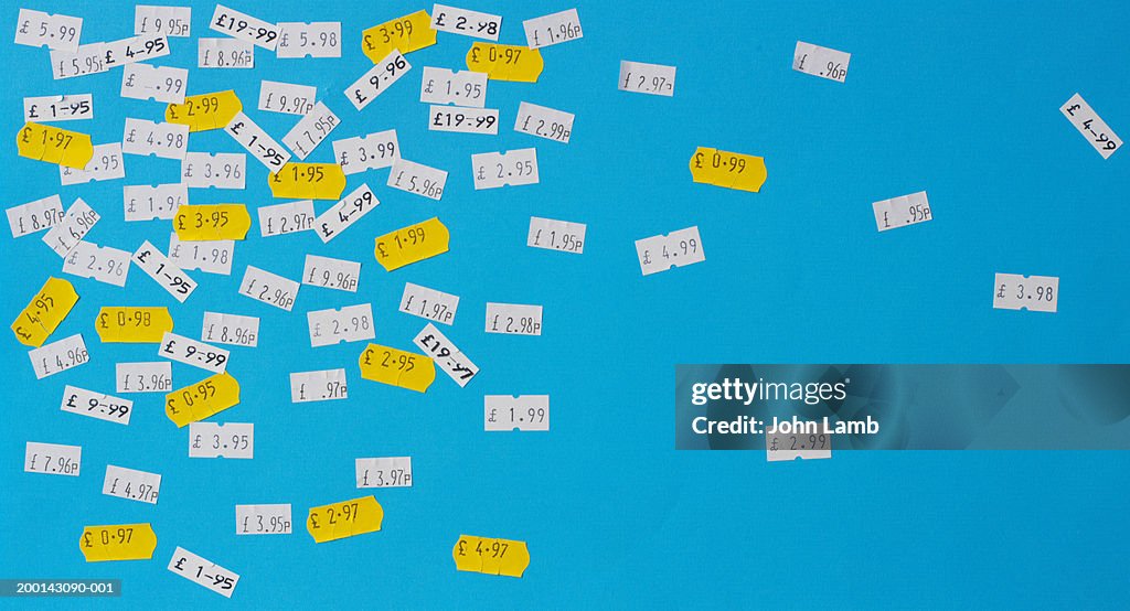 Price stickers in English currency on blue background