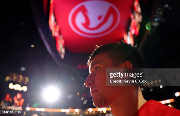 Bogdan Bogdanovic of the Atlanta Hawks looks on during player introductions prior to facing the Houston Rockets at State Farm Arena on February 10,...