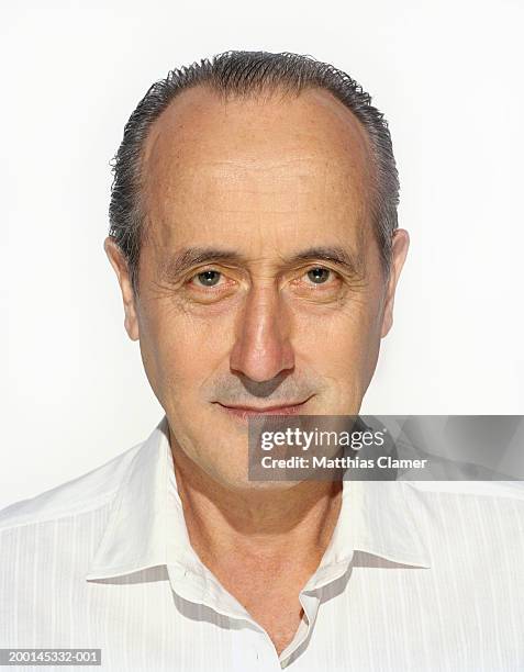 mature man smiling, portrait - stoneplus4 stock pictures, royalty-free photos & images