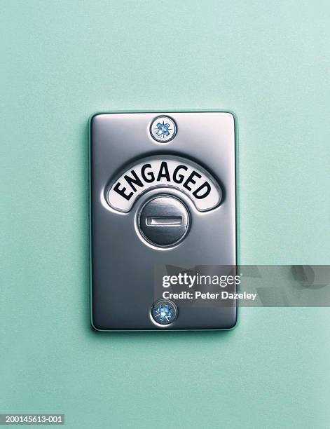 'engaged' lock, close up - public bathroom stock pictures, royalty-free photos & images