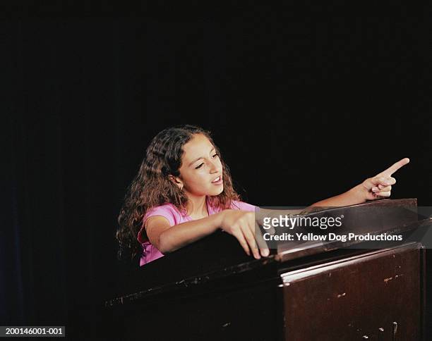 teenage girl (12-14) speaking at podium - samlingssal bildbanksfoton och bilder