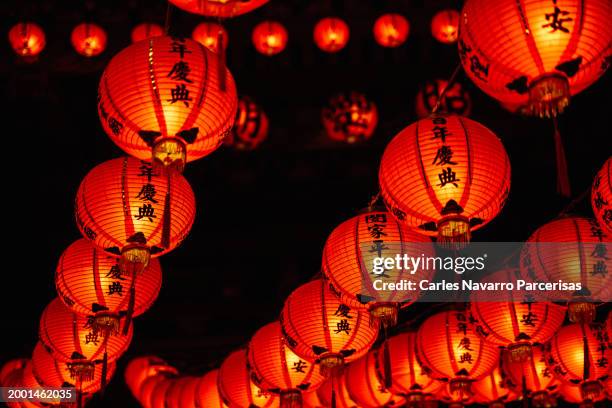 chinese new year celebration with red lanterns. china town - asian market stock pictures, royalty-free photos & images