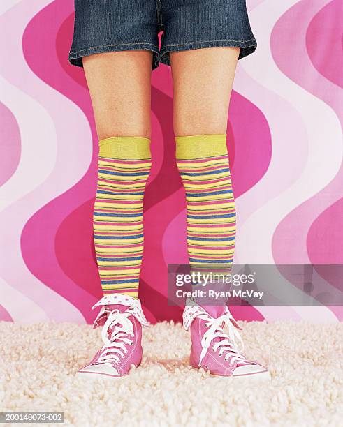 woman wearing knee high socks, low section - striped socks stock pictures, royalty-free photos & images