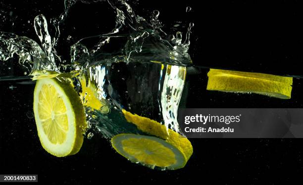 Slices of a lemon are seen after splashing in water in Ankara, Turkiye on February 07, 2024.