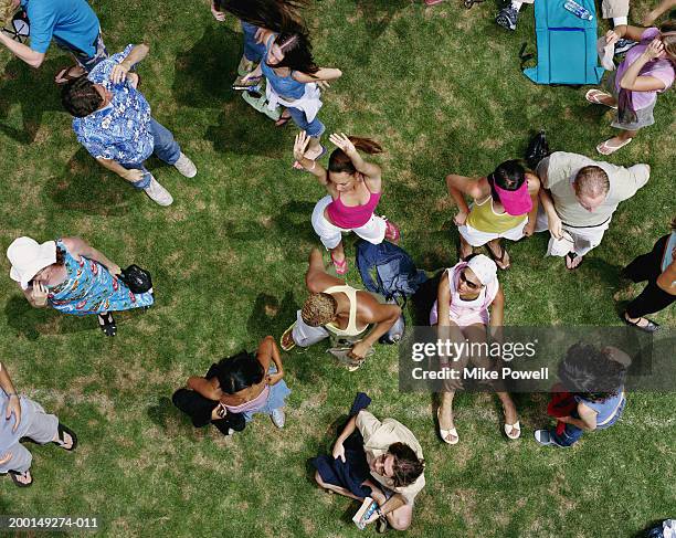 crowd of young adults at outdoor event, elevated view - day of the dead festival london stockfoto's en -beelden