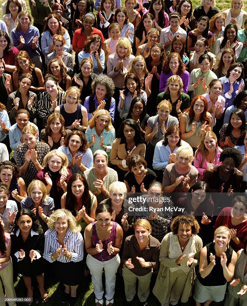 Crowd of women clapping, portrait, elevated view