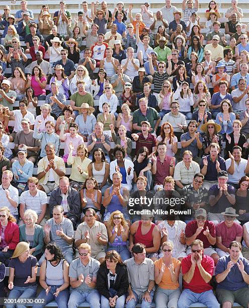 stadium crowd clapping, elevated view - crowd outside stadium stock pictures, royalty-free photos & images