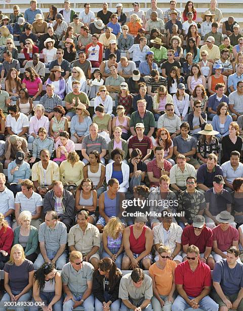 stadium crowd watching game, elevated view - bleachers stock pictures, royalty-free photos & images