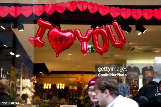Valentine's Day decorations are being displayed on a city street in Krakow, Poland, on February 12.