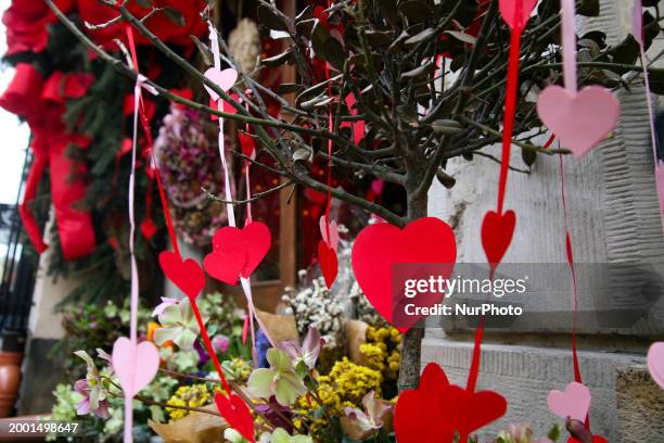 Valentine's Day decorations are being displayed on a city street in Krakow, Poland, on February 12.