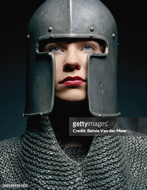 young woman wearing knight outfit, close up - knight person stock pictures, royalty-free photos & images