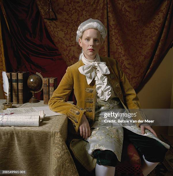 woman at desk, in male costume from regency era, portrait - stoneplus5 stock-fotos und bilder