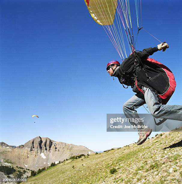 paraglider taking off,  jackson hole, wyoming, usa - paragliding bildbanksfoton och bilder