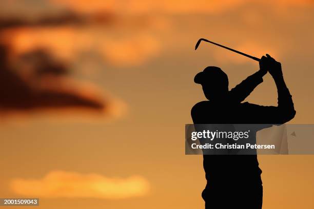 Jordan Spieth of the United States plays his second shot on the ninth hole during the third round of the WM Phoenix Open at TPC Scottsdale on...