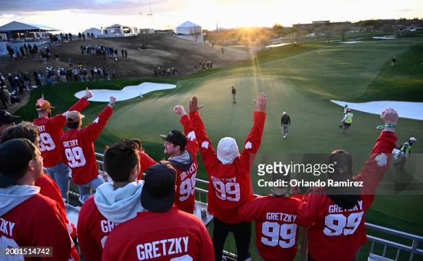 Fans of Nick Taylor of Canada wearing "Gretzky" jerseys cheer on the sixth hole as Nick Taylor of Canada approaches during the third round of the WM...