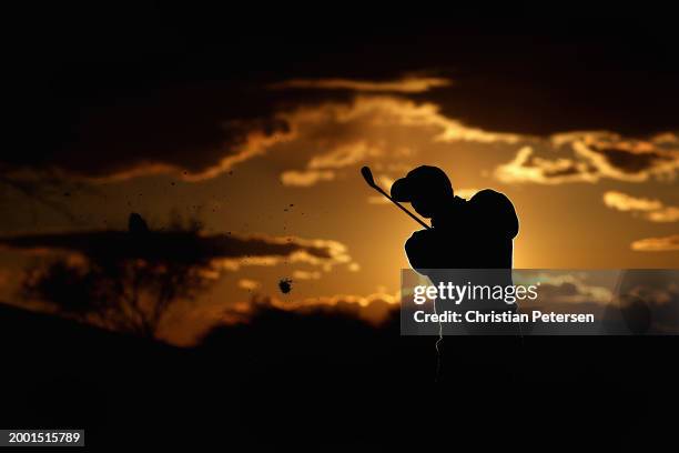 Sam Burns of the United States plays his second shot on the ninth hole during the third round of the WM Phoenix Open at TPC Scottsdale on February...