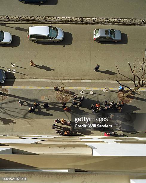 people walking on street, overhead view - stoneplus5 stock-fotos und bilder