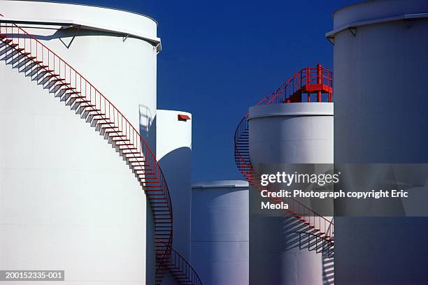 winding staircases on oil storage tanks - silos stock pictures, royalty-free photos & images