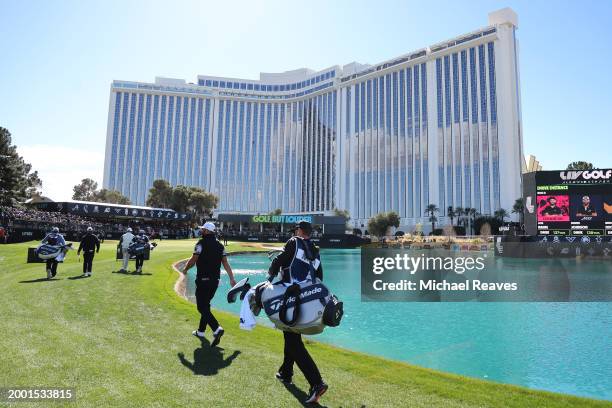 Captain Jon Rahm of Legion XIII and captain Dustin Johnson of 4Aces GC walk to the eighth green during day three of the LIV Golf Invitational - Las...