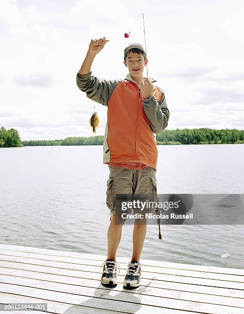 2,172 Boy Fishing Standing Stock Photos, High-Res Pictures, and