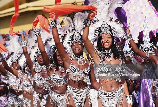 group of women in carnival costumes with hands in air, portrait - trinité et tobago photos et images de collection