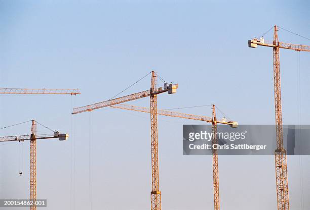cranes, high section - construction cranes stock pictures, royalty-free photos & images