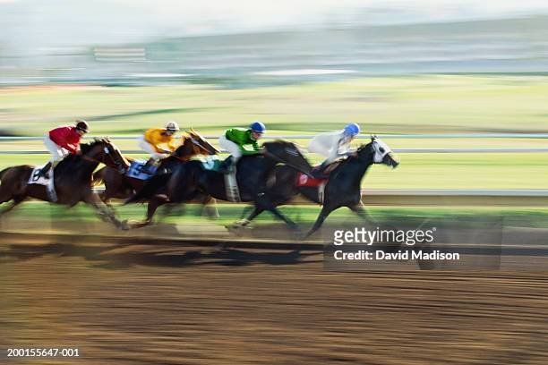 home stretch of horse race (digital enhancement) - rennpferd stock-fotos und bilder