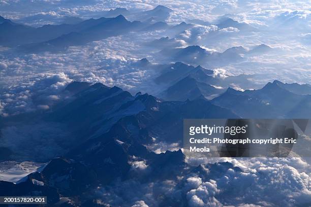 clouds over alps, aerial view - travel11 stock pictures, royalty-free photos & images