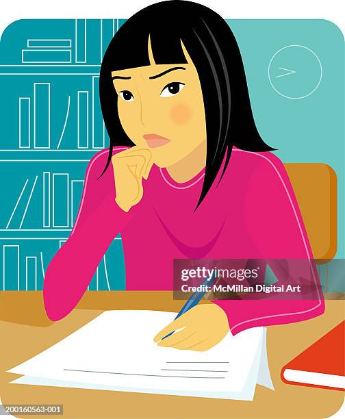 girl sitting at desk writing paper, resting chin on hand - schulkind nur mädchen stock-grafiken, -clipart, -cartoons und -symbole