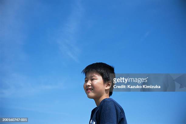 boy (8-10) smiling - kazuko kimizuka ストックフォトと画像