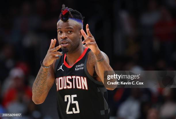 Reggie Bullock Jr. #25 of the Houston Rockets reacts after hitting a three-point basket against the Atlanta Hawks during the second quarter at State...