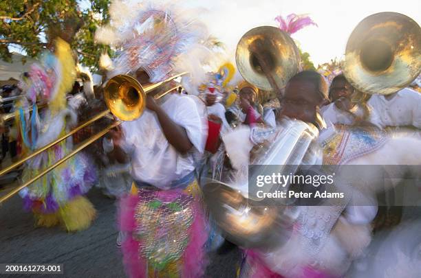 bahamas, new providence island, junkanoo festival (blurred motion) - caribbean musical instrument stock pictures, royalty-free photos & images