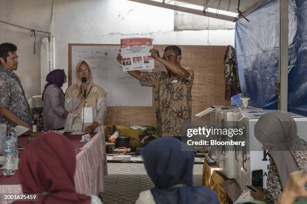 Electoral officials tally ballots at a polling station in South Tangerang, Banten, Indonesia, on Wednesday, Feb. 14, 2024. Indonesia's Defense...