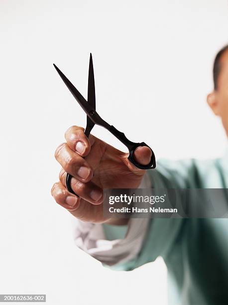 Someone Using Scissors 8.055 People Holding Scissors Stock Photos, High-Res Pictures, and ...