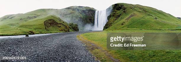 iceland, skogafoss, (waterfall), (digital enhancement) - travel11 stock pictures, royalty-free photos & images