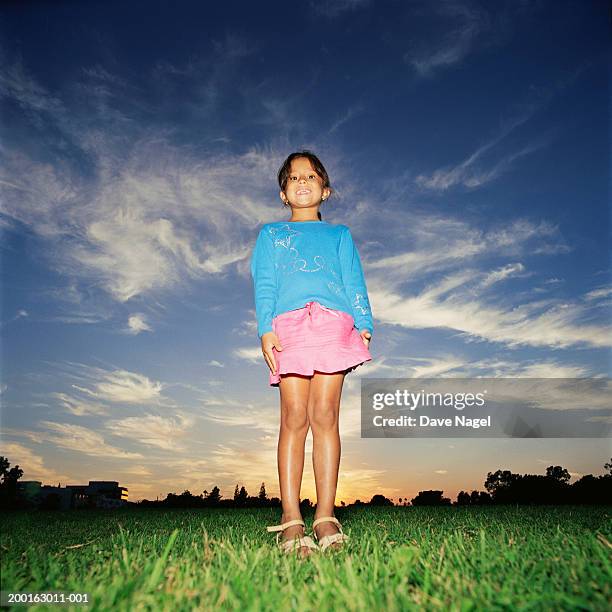 girl (5-7) outdoors, portrait, low angle view - stoneplus8 stock pictures, royalty-free photos & images