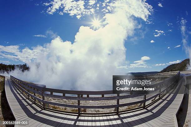usa, wyoming, yellowstone national park, walkway and geyser (fish eye) - travel11 stock pictures, royalty-free photos & images