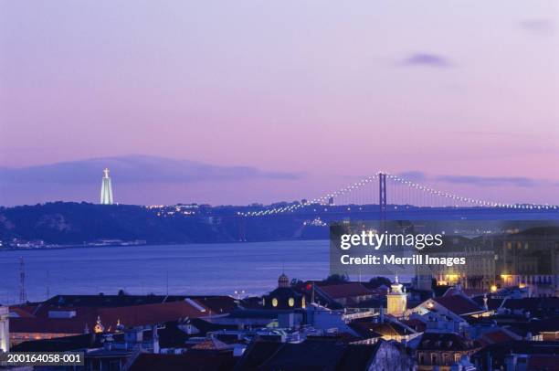 portugal, lisbon, april 25th bridge and tagus river, dusk, apr 2003 - tagus river stock pictures, royalty-free photos & images