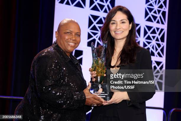 Kim Crabbe presents Esmerelda Nergon with the Kim Crabbe Game Changers Award at the U.S. Soccer Awards Dinner Reception during the U.S. Soccer Annual...