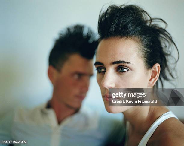 young couple, close-up (focus on woman) - backcombed stock pictures, royalty-free photos & images