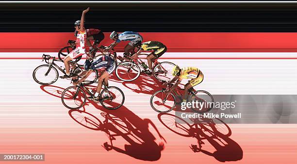 male cyclist racing in velodrome - cycle race side view stock pictures, royalty-free photos & images
