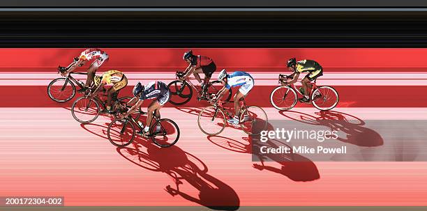 male cyclist racing in velodrome - cycle race side view stock pictures, royalty-free photos & images