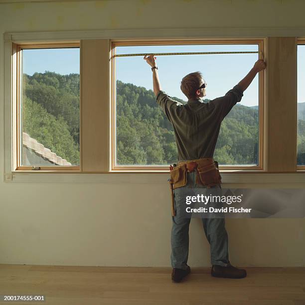 1,537 Man Measuring Window Stock Photos, High-Res Pictures, and Images ...