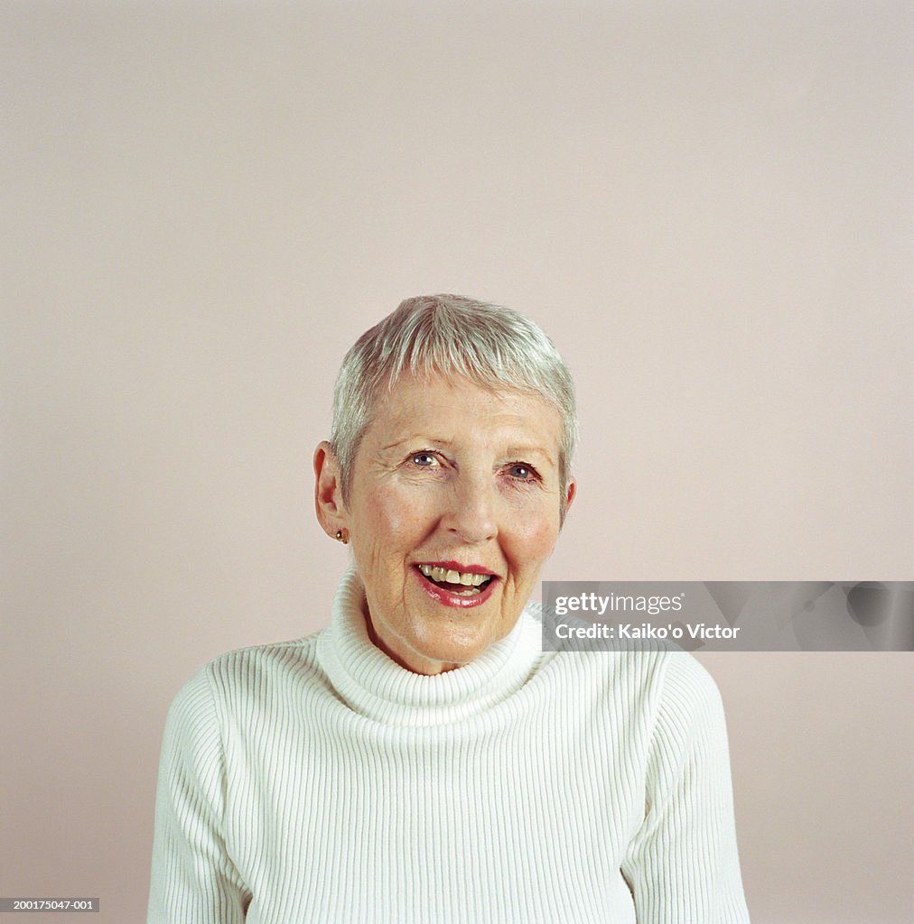 Senior woman smiling, portrait
